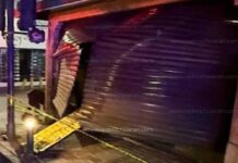 Delincuentes causan daños en un local comercial y arrojan bomba molotov, en el Centro de Uruapan